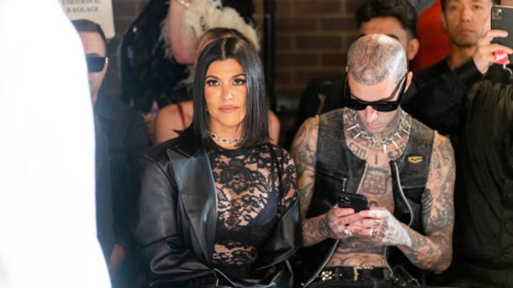 NEW YORK, NEW YORK - SEPTEMBER 13: Kourtney Kardashian (L) and Travis Barker attend the Boohoo X Kourtney Kardashian fashion show during New York Fashion Week: The Shows on the High Line on September 13, 2022 in New York City. (Photo by Gotham/WireImage)